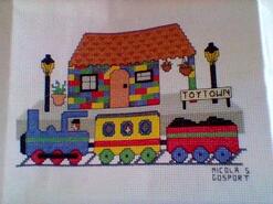 Cross stitch square for Reece B's quilt
