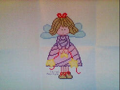 Cross stitch square for Talia May C's quilt