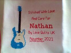 Cross stitch square for Nathan P's quilt