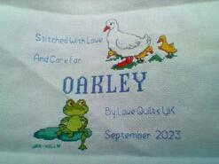 Cross stitch square for Oakley H's quilt