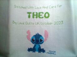 Cross stitch square for Theo's quilt