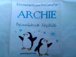 Cross stitch square for Archie E's quilt