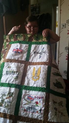 Photo of Ryan Gs quilt