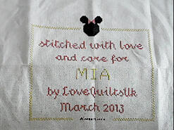 Cross stitch square for Mia B's quilt