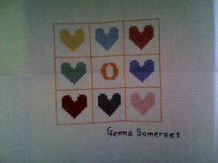 Cross stitch square for Olivia B's quilt