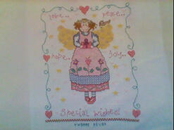 Cross stitch square for River U's quilt
