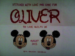 Cross stitch square for Oliver W's quilt