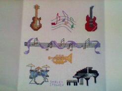 Cross stitch square for Poppy W's quilt