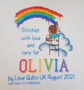 Cross stitch square for Olivia F's quilt