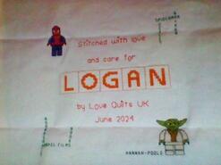 Cross stitch square for Logan W's quilt