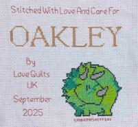 Cross stitch square for Oakley T's quilt