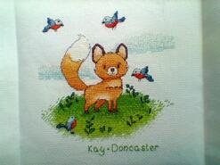 Cross stitch square for Oakley T's quilt