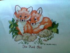 Cross stitch square for Oakley T's quilt