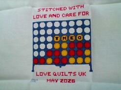 Cross stitch square for Theo's quilt