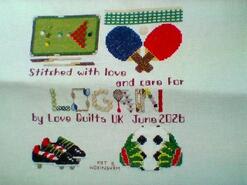 Cross stitch square for Logan W's quilt