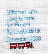Cross stitch square for Armani M's quilt