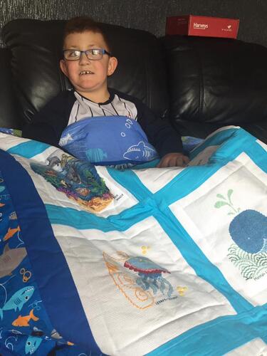 Photo of Drew Cs quilt