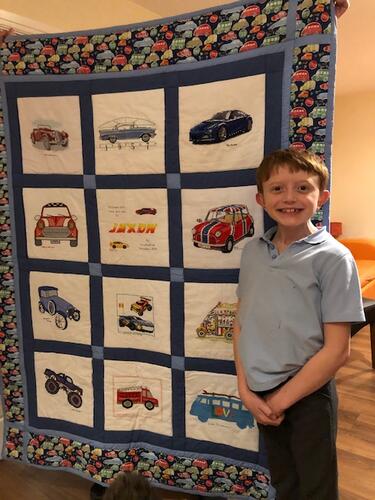 Photo of Jaxon Gs quilt