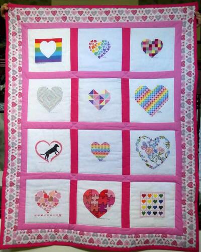 Photo of (QUILTED) Heartss quilt