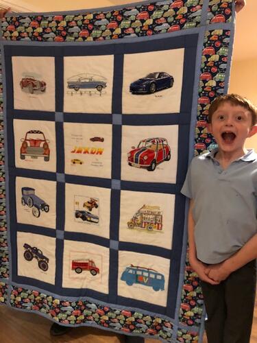 Photo of Jaxon Gs quilt