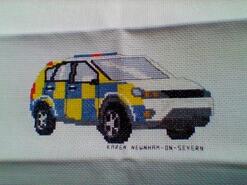 Cross stitch square for Harry S's quilt